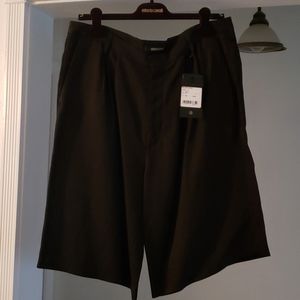 Men's Black knee shorts.
